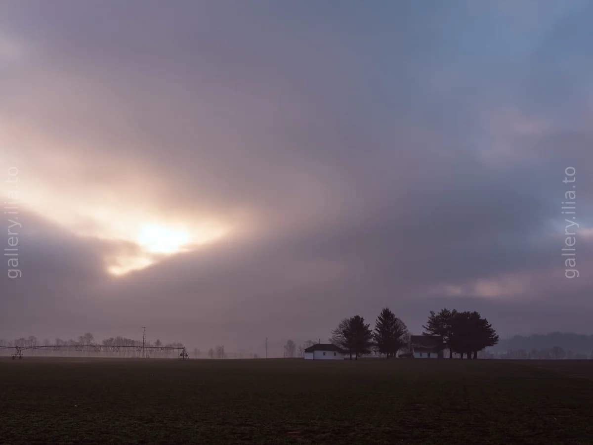 Dawn breaks over the fields